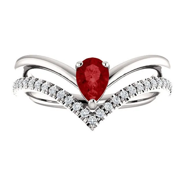14KT GOLD 1/2 CT PEAR RUBY & 1/6 CTW DIAMOND NEGATIVE SPACE "V" RING
