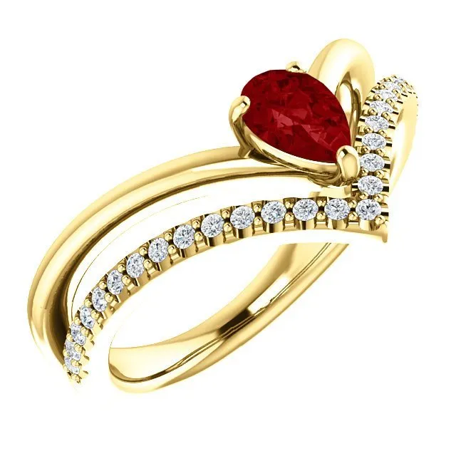 14KT GOLD 1/2 CT PEAR RUBY & 1/6 CTW DIAMOND NEGATIVE SPACE "V" RING