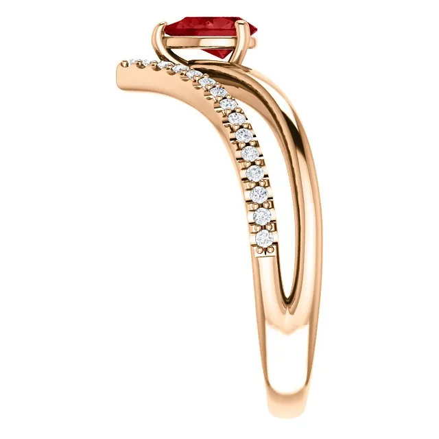 14KT GOLD 1/2 CT PEAR RUBY & 1/6 CTW DIAMOND NEGATIVE SPACE "V" RING