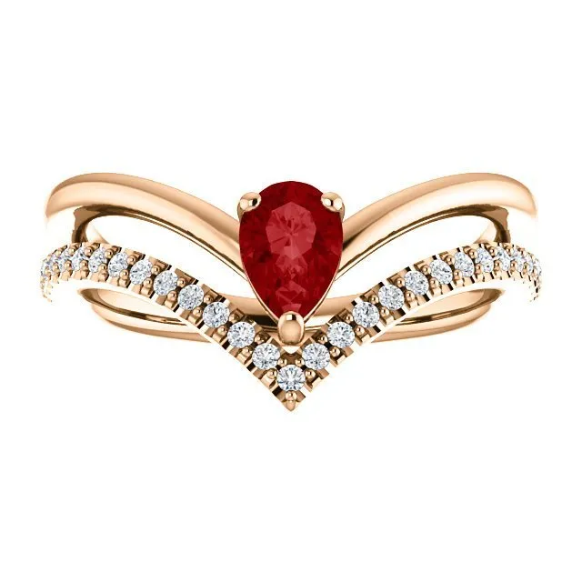 14KT GOLD 1/2 CT PEAR RUBY & 1/6 CTW DIAMOND NEGATIVE SPACE "V" RING