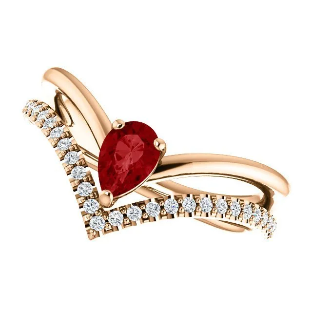 14KT GOLD 1/2 CT PEAR RUBY & 1/6 CTW DIAMOND NEGATIVE SPACE "V" RING