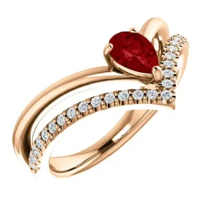 14KT GOLD 1/2 CT PEAR RUBY & 1/6 CTW DIAMOND NEGATIVE SPACE "V" RING