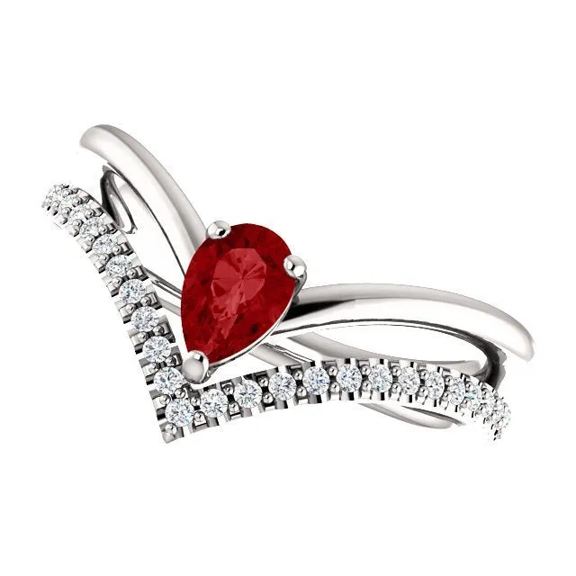 14KT GOLD 1/2 CT PEAR RUBY & 1/6 CTW DIAMOND NEGATIVE SPACE "V" RING