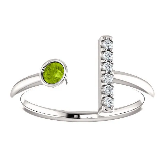 14KT GOLD .13 CT PERIDOT & .05 CTW DIAMOND BEZEL BAR RING