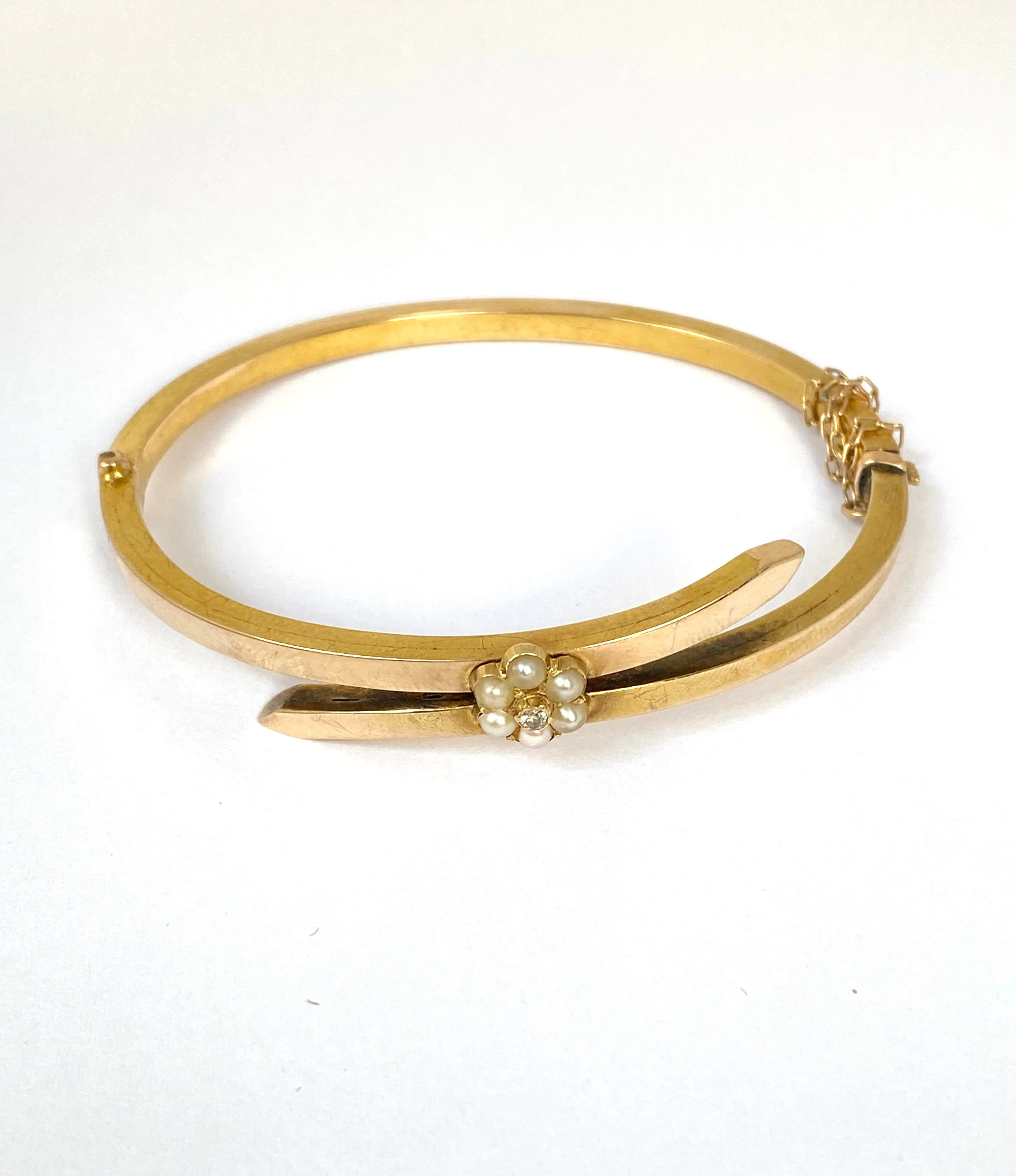 Antique, 15ct Gold Crossover Bangle with Seed pearl and Diamond Flower Decoration