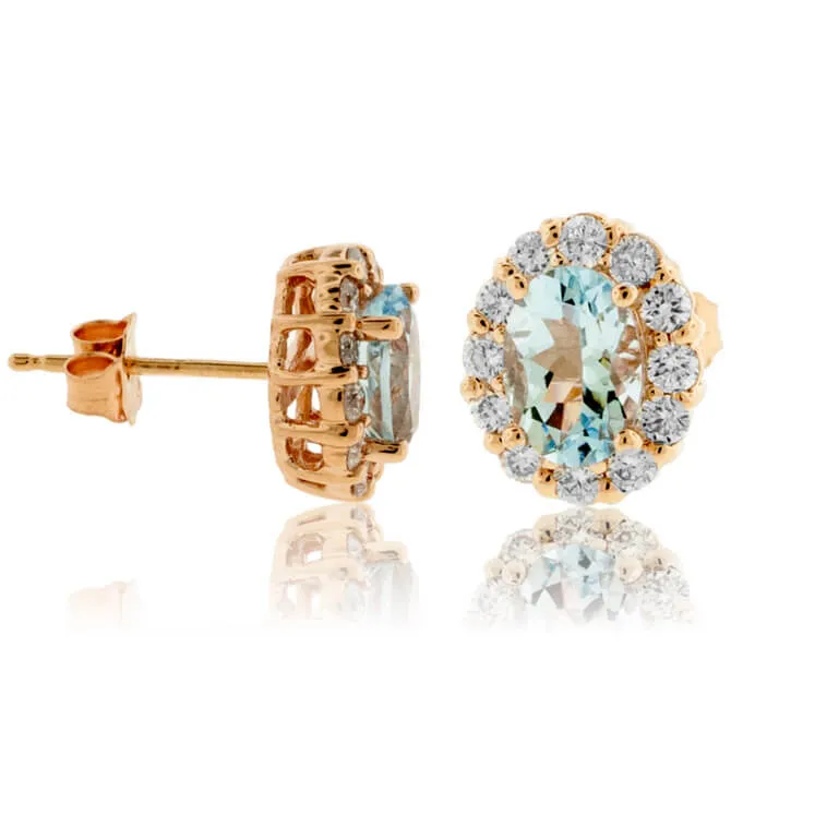 Oval Aquamarine and Diamond Halo Stud Earrings