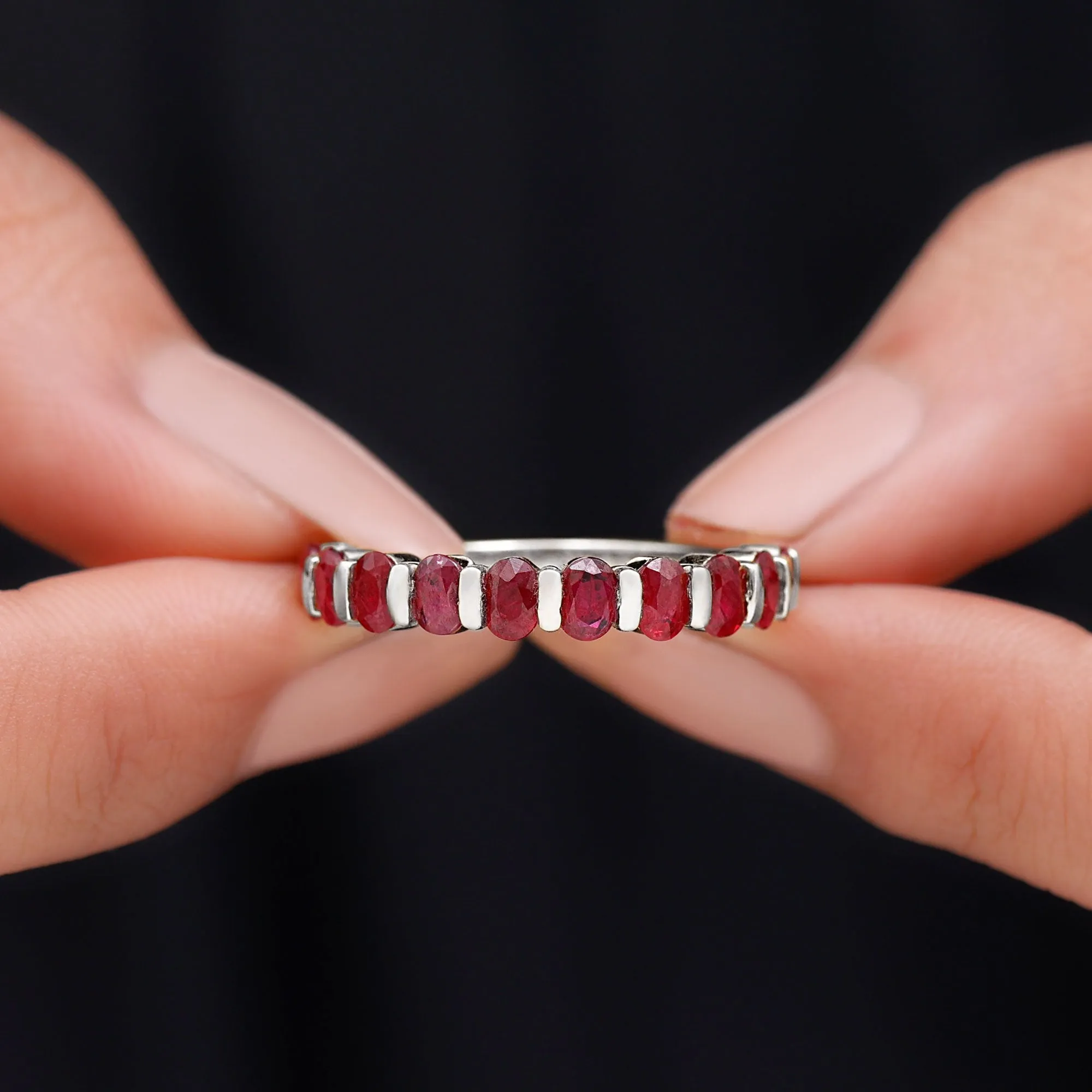 Oval Cut Created Ruby Half Eternity Ring in Bar Setting