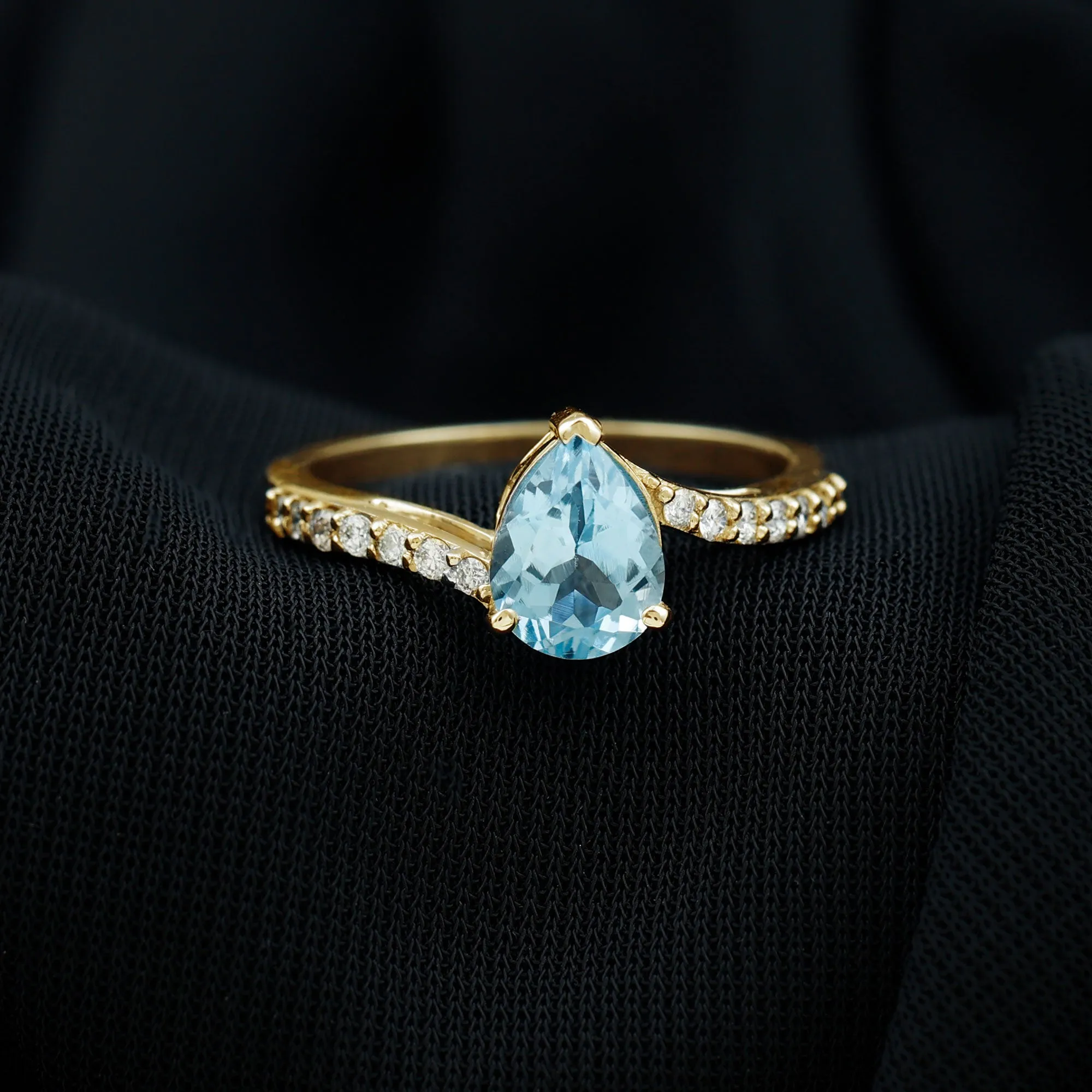 Pear Cut Aquamarine Solitaire Ring with Diamond Bypass Shank