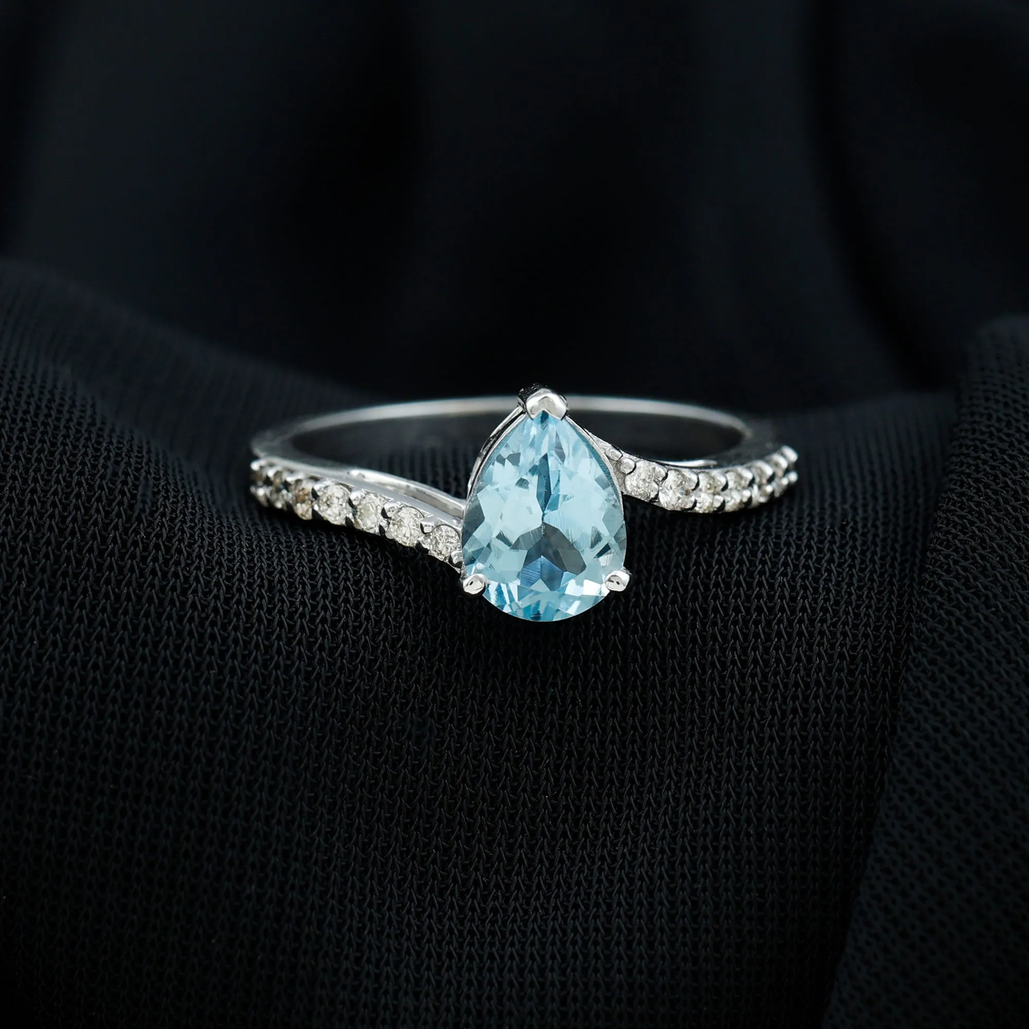 Pear Cut Aquamarine Solitaire Ring with Diamond Bypass Shank
