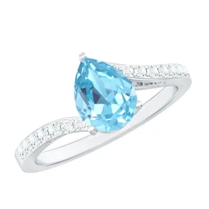 Pear Cut Aquamarine Solitaire Ring with Diamond Bypass Shank