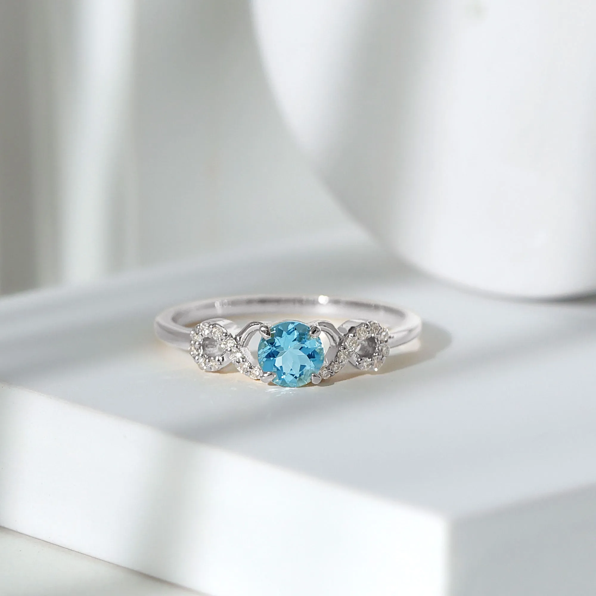 Round Shape Aquamarine and Diamond Infinity Engagement Ring
