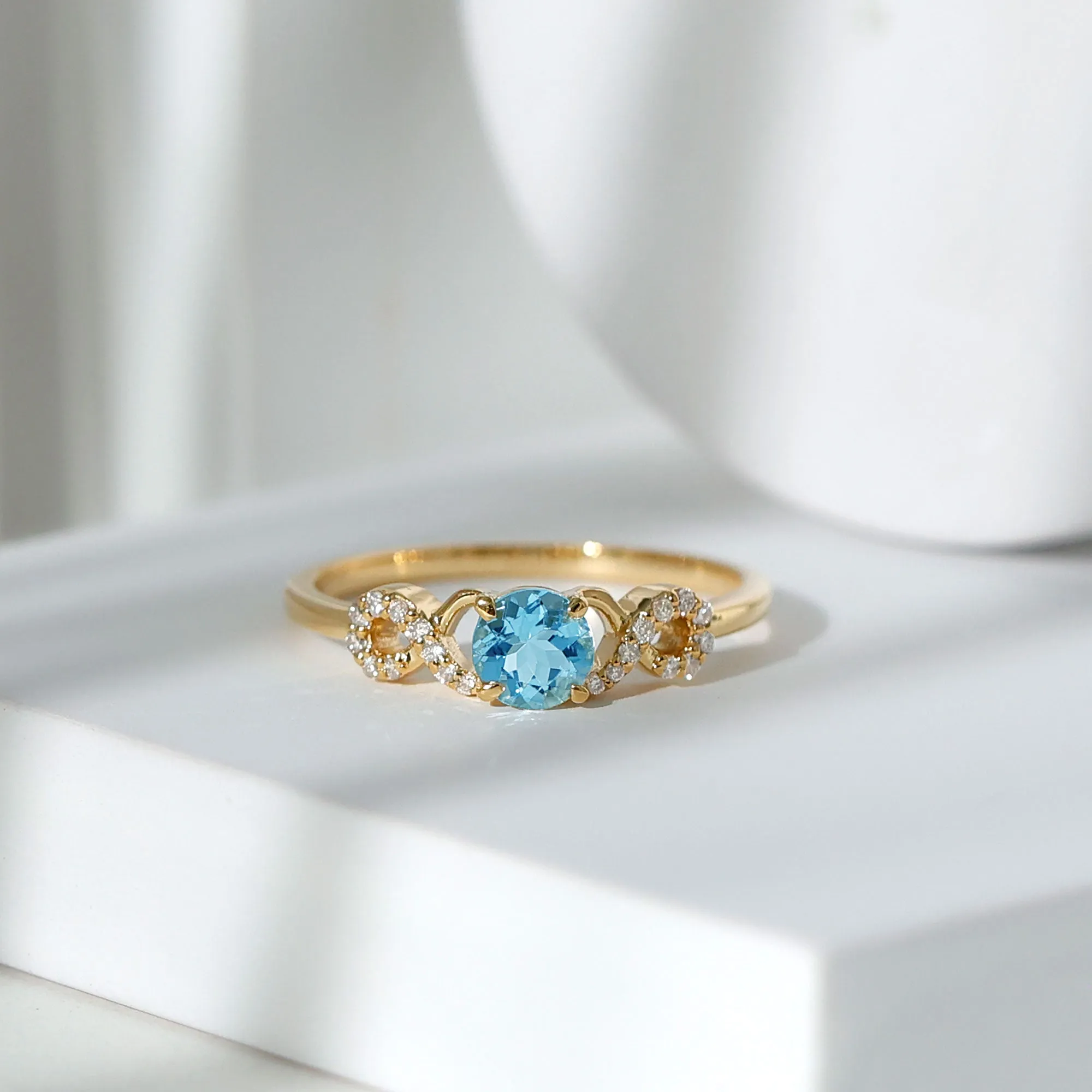 Round Shape Aquamarine and Diamond Infinity Engagement Ring
